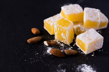 Sweet pieces of yellow turkish delight  .