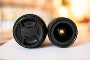 Fototapeta na wymiar Close up of 2 DSLR lenses with nice soft background.