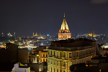 Galata Kulesi Tower at night in Istanbul, Turkey. Ancient Turkish famous landmark in Beyoglu district, European side of the city. Architecture of the Constantinople.A historical place  made by Genoese