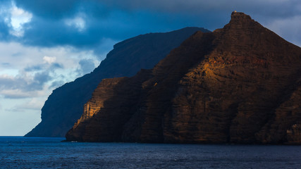 view from the sea with the eastern coast of St. Helena island in the Atlantic Ocean