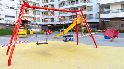 Children's playground is closed. No children on the Playground in the yard.Prevention of coronavirus COVID-19. Ban on children 's playgrounds. The fight against the virus. 