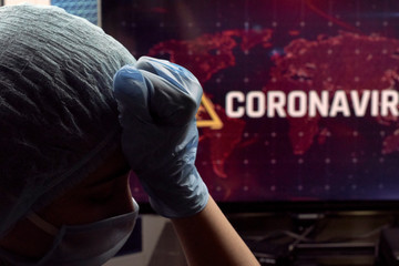 Obraz na płótnie Canvas Exhaustion of doctor or nurse fighting the coronavirus