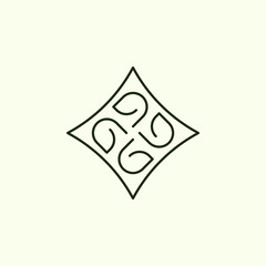 Fototapeta premium four letters G made in the form of a cross-shaped pattern in a frame