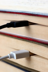 abstraction with a usb cable connected to the book