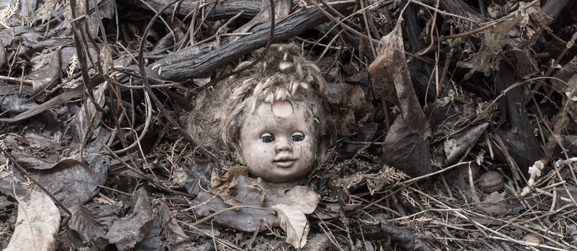 halloween doll head on a ground