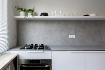 Stylish kitchen with gray countertop - obrazy, fototapety, plakaty