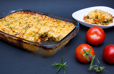 Shepherd, cottage pie dish on blue background