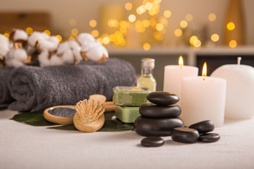 Fototapeta na wymiar Spa composition with Christmas decoration. Holiday SPA treatment. Zen and relax concept.