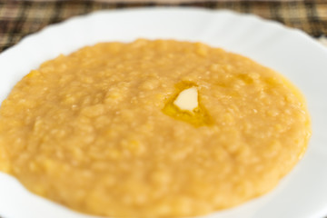 Yellow pea puree in a plate