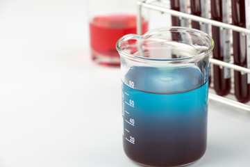 Methylene blue test liquid with blood sample for test, laboratory sample of blood testing for diagnosis virus infection, the pandemic infectious concept