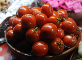 Sour tomatoes on a plate during the New Year's fair, in Kiev, January 4, 2019
