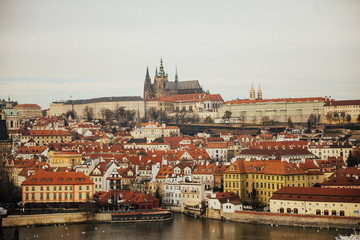 Fototapeta na wymiar The panorama of Prazhsky Hrad in the center of Prague. Panoramic view on Old Town , Prague Castle Saint Vitus Cathedral, Vltava river. Prague, Czech Republic . European travel. 
