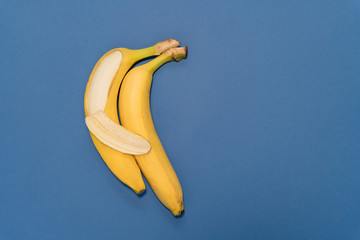 Banana on blue background. Relationship concept