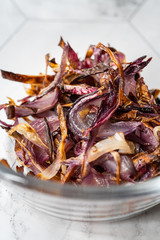 Caramelized Onion Slices in Glass Bowl.