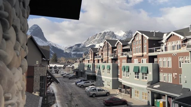 Cinematic Push In Of Resort With Mountain Range Background.