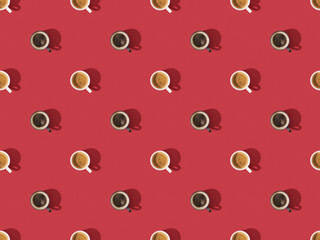 top view of cups of fresh coffee on red, seamless background pattern