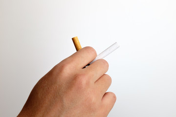 Short cigarette on white background