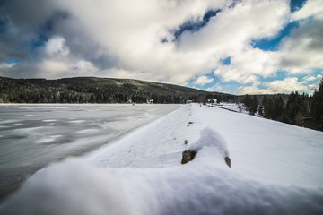 Winter scenery of water reservoir Sous located in Jizera Mountains