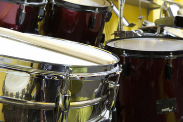 Fototapeta na wymiar Drums with Drumsticks on a snare in a recording studio