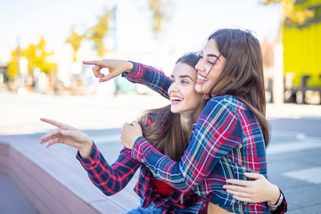 Two best female friends embracing together