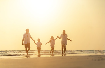 Asian family vacation at the beach with family relationships caused love and understanding to strengthen social immunity.