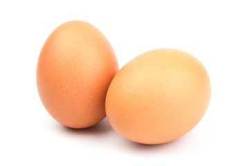 Brown chicken eggs, isolated on white background.