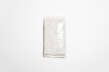 Top view of Rice packed in plastic bag isolated on white background. Rice in a transparent plastic bag.Mock-up.High-resolution photo.
