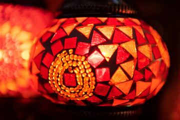 Red Moroccan lamp with red glass mosaic design. Oriental style