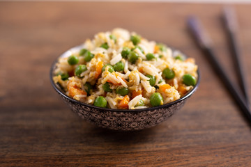 Oriental cantonese rice. Basmati rice with green peas, eggs and carrots.