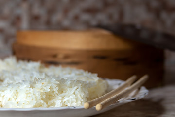 Rice cooked in a traditional wooden steamer has a special taste. You can eat it as a separate dish, as a side dish, or as an addition or ingredient to other dishes. My favourite is jasmine rice.