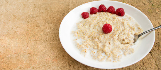 A plate of porridge on a stone background