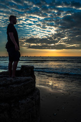 model on the beach at sunset