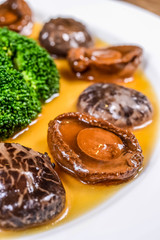 Stewed Abalone, Dried Mushroom And Broccoli With Abalone Sauce