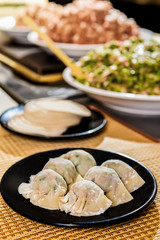 Uncooked Wonton On The Black Plate