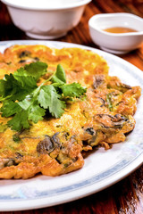 Pan Fry Oysters Cake On The White Plate