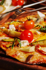 Tomato Pizzas With Vegetables , Parmesan And Mozzarella Cheese 