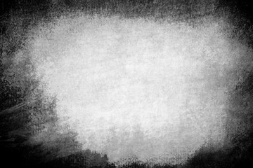 An abstract faded black and white grunge background image.