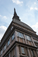 details of the Mole Antonelliana towering on the city di Torino