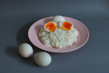 Boiled duck egg and Jasmine rice on a plate, Cheap Thai food