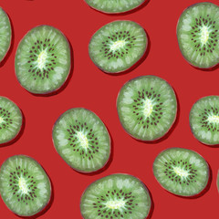 Fototapeta premium Seamless pattern with fruits, kiwi. Design for wallpaper, background, fabric, textile, cafe, restaurant, resort, packaging.