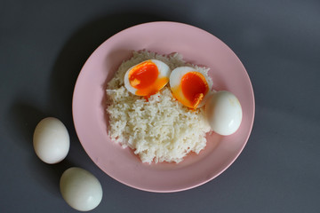 Boiled duck egg and Jasmine rice on a plate, Cheap Thai food