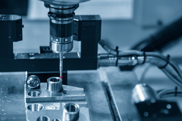 The multi-axis,CMM probe  measure dimension of the aluminium casting  parts .The quality control in automotive  parts manufacturing process by multi-axis CMM machine.