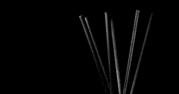 Aroma Diffuser Sticks a black background