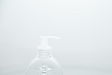 Antibacterial transparent hand sanitizer gel in a plastic bottle. Coronavirus (Covid-19) preventive measures top view concept