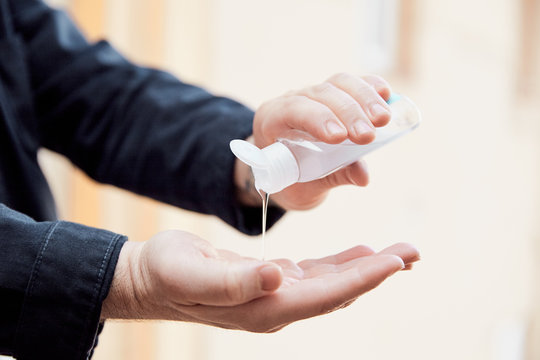 Washing hands with alcohol gel or anti bacteria soap sanitizer to make cleaning and clear bacteria. Hygiene concept.