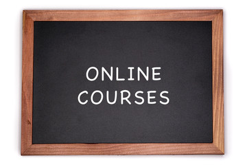 Obraz premium Online courses written on chalkboard, white background