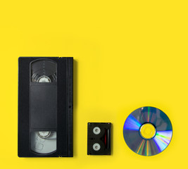 CD-ROM and video tapes as a concept of evolution of media storage. Storage media of the past