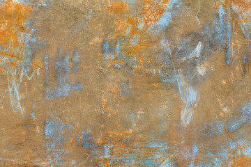 Stara i rdzawa ściana metalowa ze śladami niebieskiej farby - obrazy, fototapety, plakaty