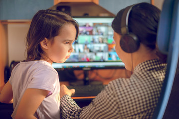 Upset mother forced to work from home as the pandemic coronavirus (COVID-19)