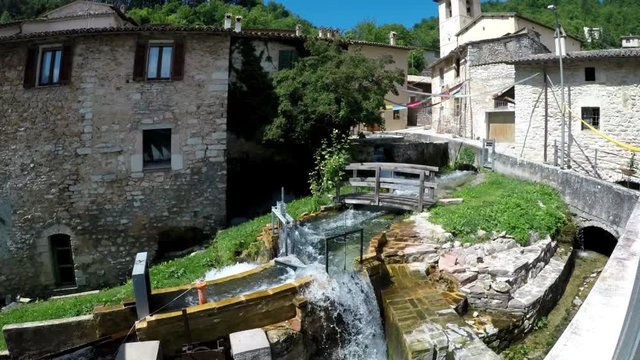 Italy, Umbria, Perugia, Rasiglia, time lapse of medieval village with torrents of water, waterfalls and streams that flow inside the village,